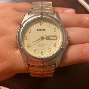 Watch for men or women, Benrus watch, has stainless steel water resistant. $500